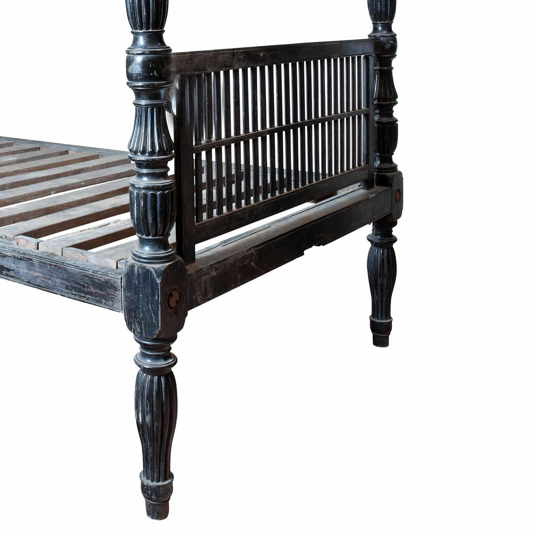 Ceylonese solid ebony four-poster bed by Collection EE20 with carved posts and slatted headboard design