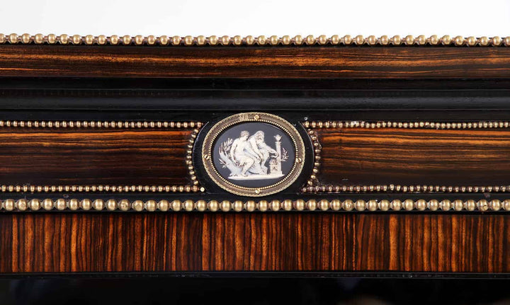 Close-up of late 19th century calamander wood vitrine cabinet with ormolu and porcelain detail by Nwtiques