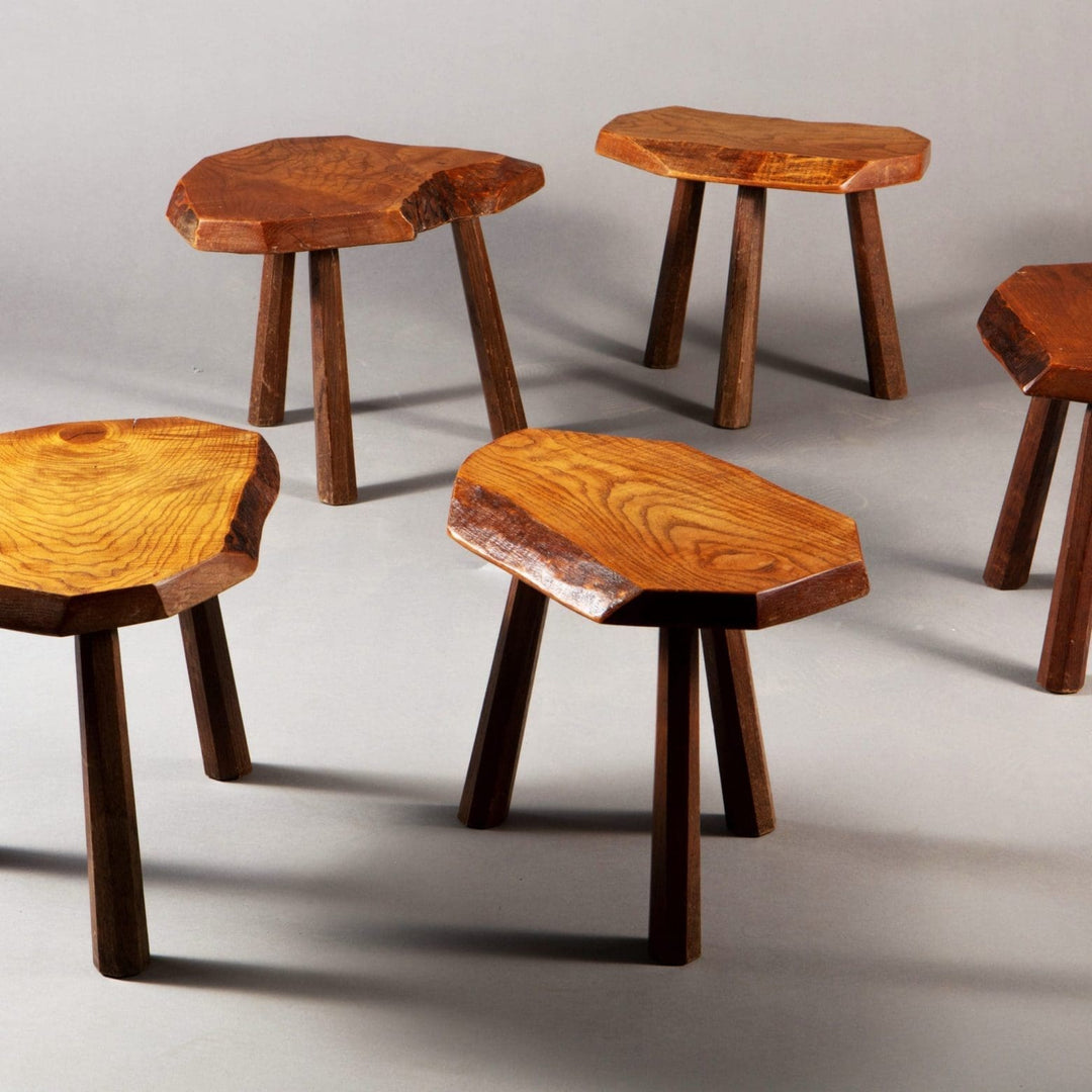 Set of five mid-century elm stools with three dark wood legs each from Collection EE30, circa 1960 France