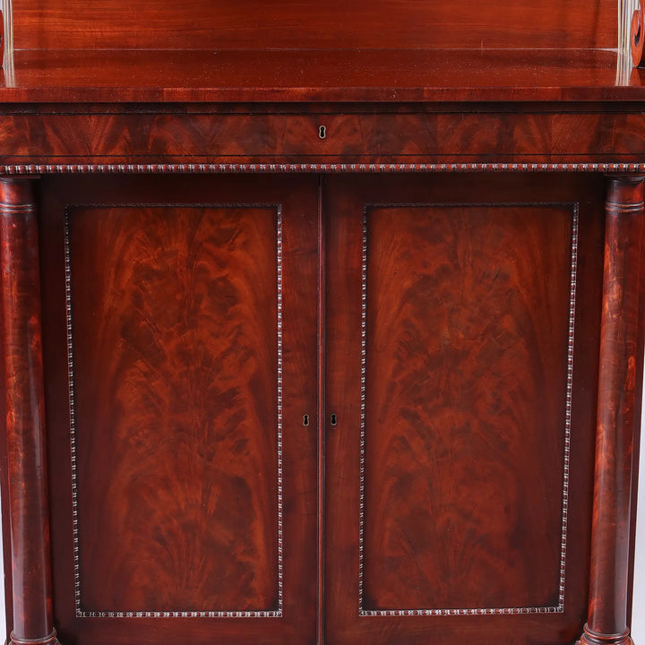 Early 19th century Regency flame mahogany chiffonier with gadrooned bun feet by Nwtiques
