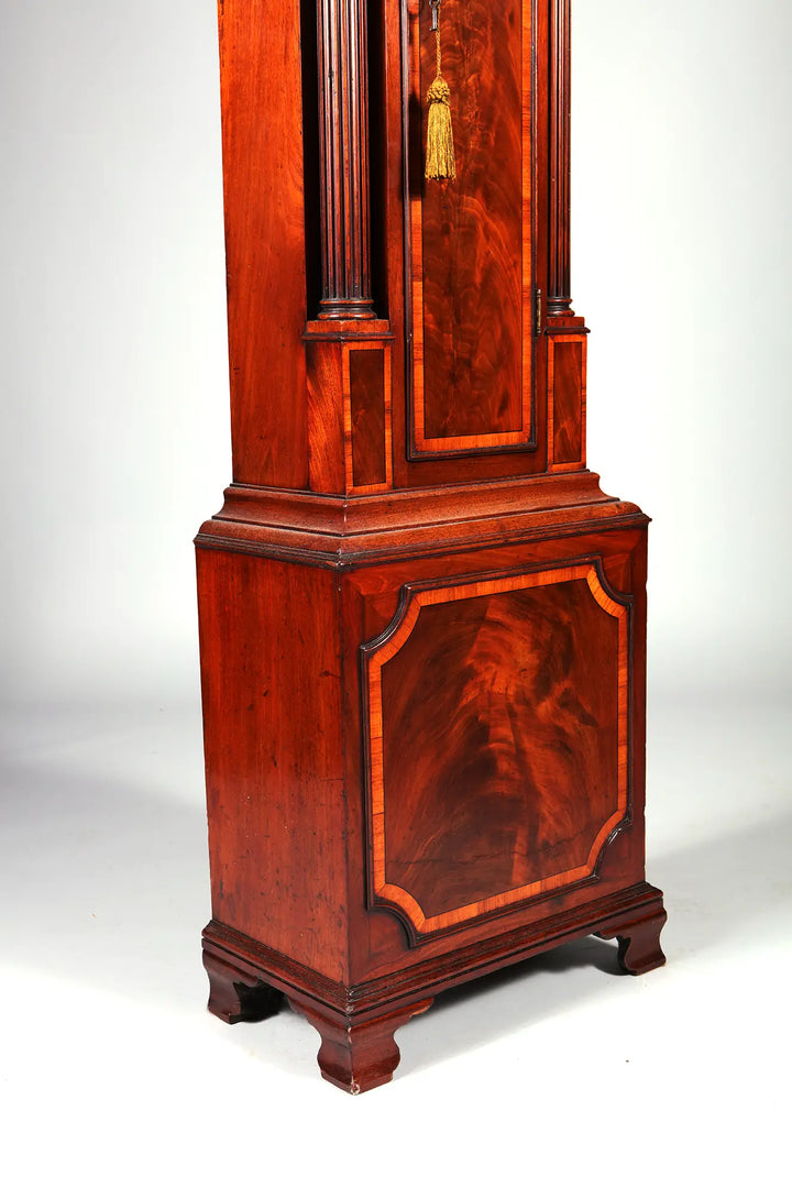 Close-up of George III mahogany longcase clock base by Thomas Wright available from Nwtiques