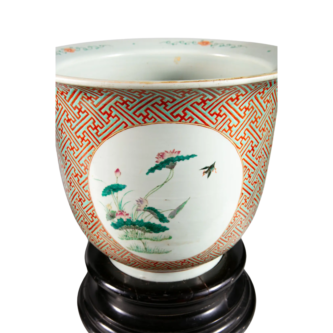 Large Chinese porcelain jardiniere with floral medallion and geometric patterns on wooden base by Nwtiques