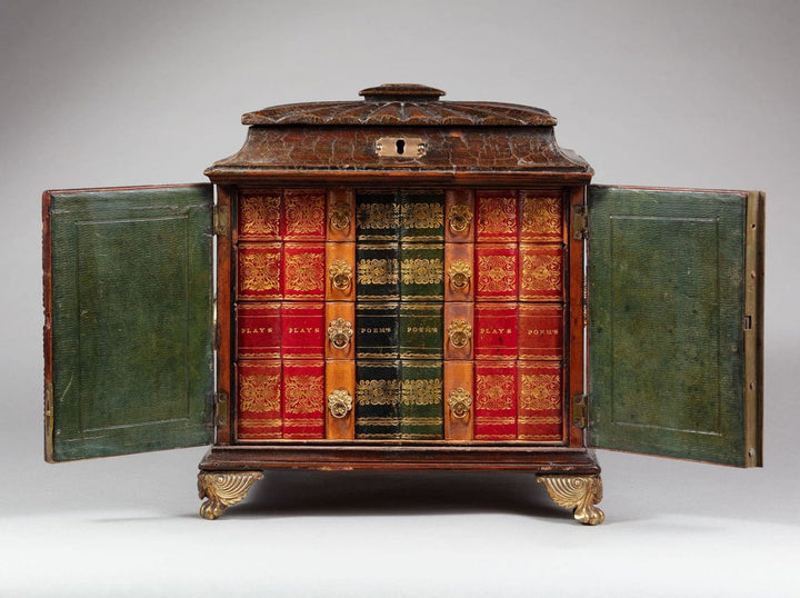 Regency leather fitted table top casket by Collection CK10 with intricate book-inspired design and brass feet