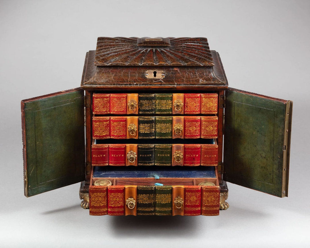 Regency leather fitted table top casket by Collection CK10 with ornate book spines and brass fittings open display