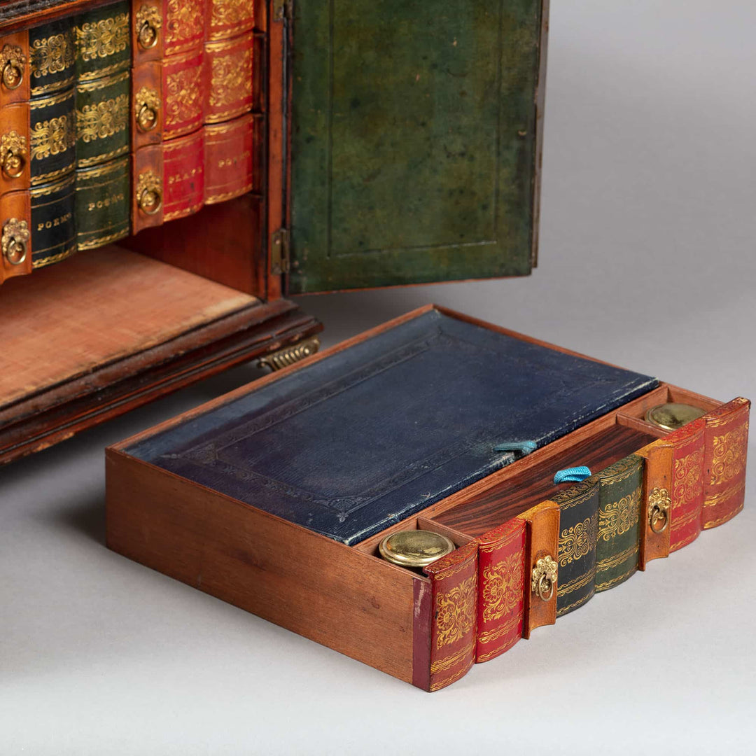 Regency leather fitted table top casket by Collection CK10 featuring detailed book spine design and fine craftsmanship