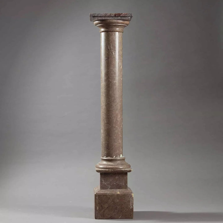 19th Century Marble Pedestal Column with turned Tuscan design, square rotating top, and stepped base, circa 1880.