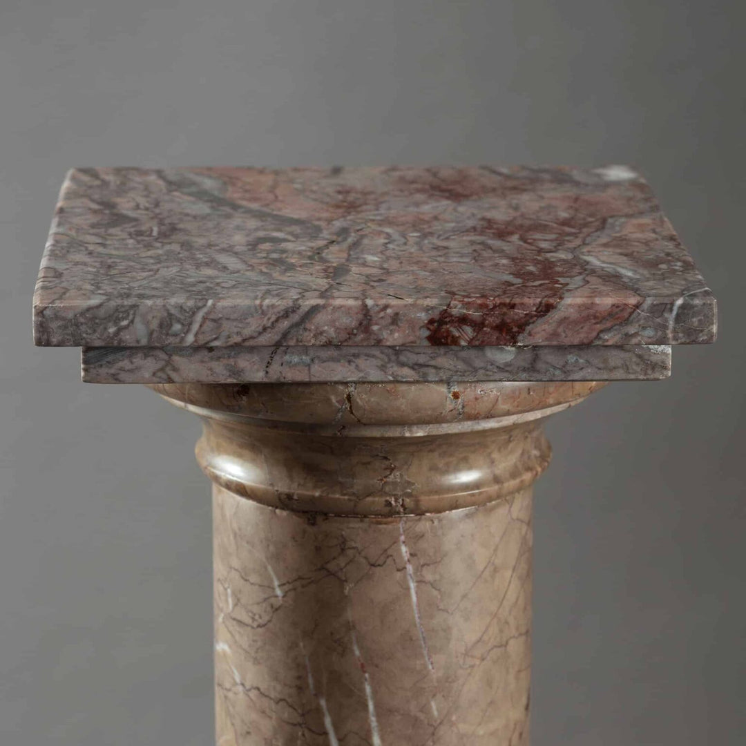 19th Century Marble Pedestal Column with a square rotating top and stepped base, circa 1880, made of turned Tuscan marble.