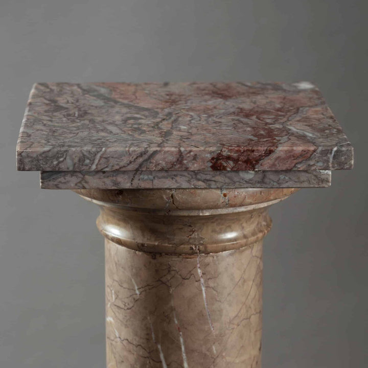 19th Century Marble Pedestal Column with a square rotating top and stepped base, circa 1880, made of turned Tuscan marble.