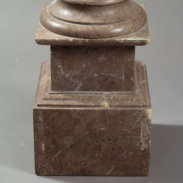 19th Century Marble Pedestal Column with turned Tuscan design, square rotating top, and stepped base in brown marble.