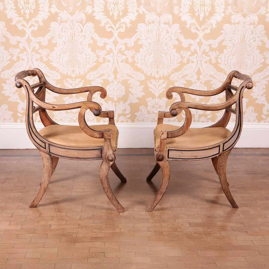 Pair of Regency armchairs with black inlay and leather seats from Collection PK10 in early 19th-century English design.