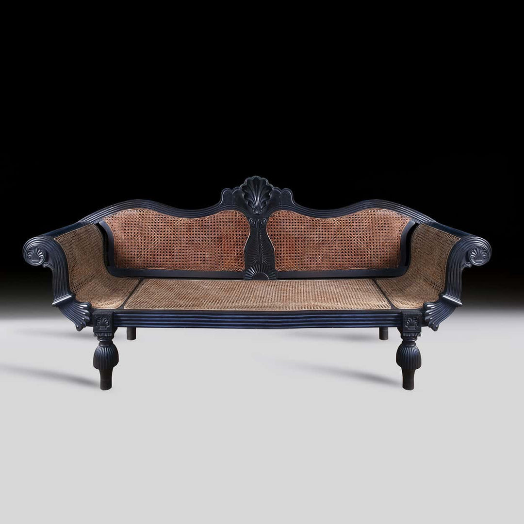 19th century Ceylonese solid ebony sofa with cane seating from Collection EE20, circa 1840, elegant antique design
