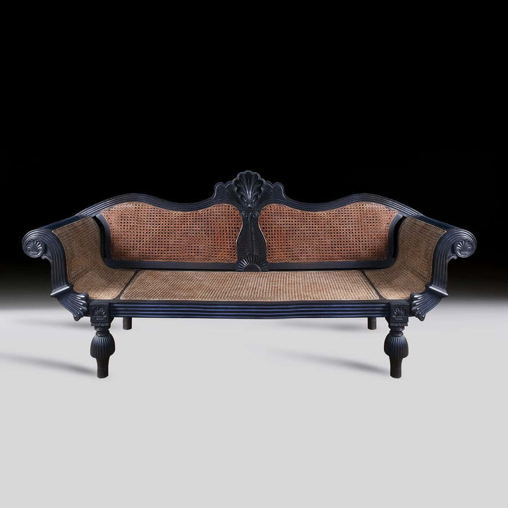 19th century Ceylonese solid ebony sofa with cane seating from Collection EE20, circa 1840, elegant antique design