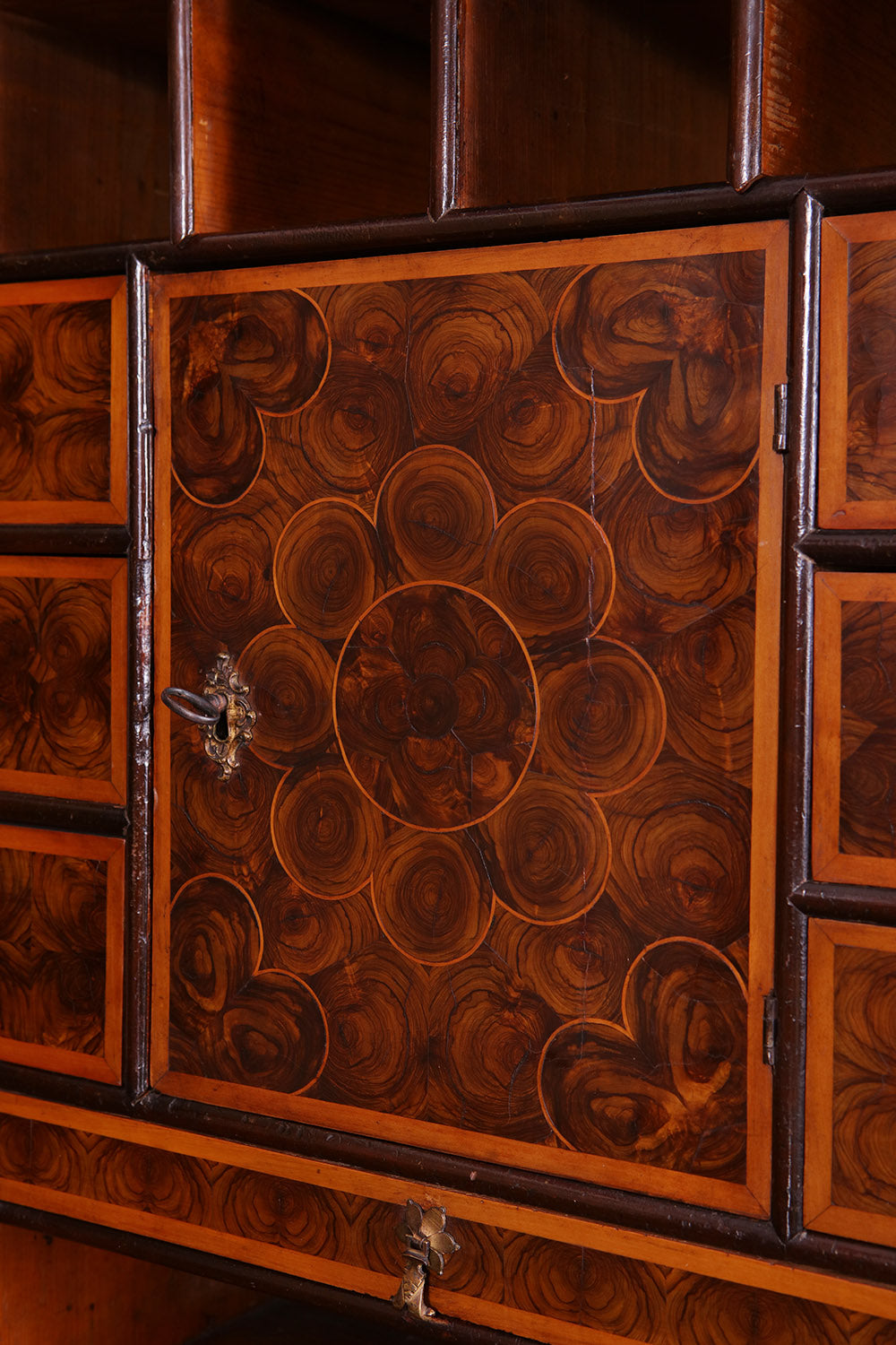 Close-up of William and Mary Laburnum oyster veneered secretaire cabinet door by Collection PK10
