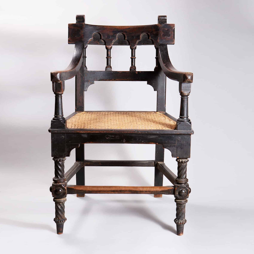 Indian Bombay Gothic armchair with cane seat and detailed carvings, vintage style from Collection EE30