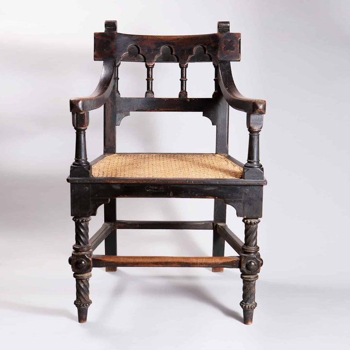 Indian Bombay Gothic armchair with cane seat and detailed carvings, vintage style from Collection EE30