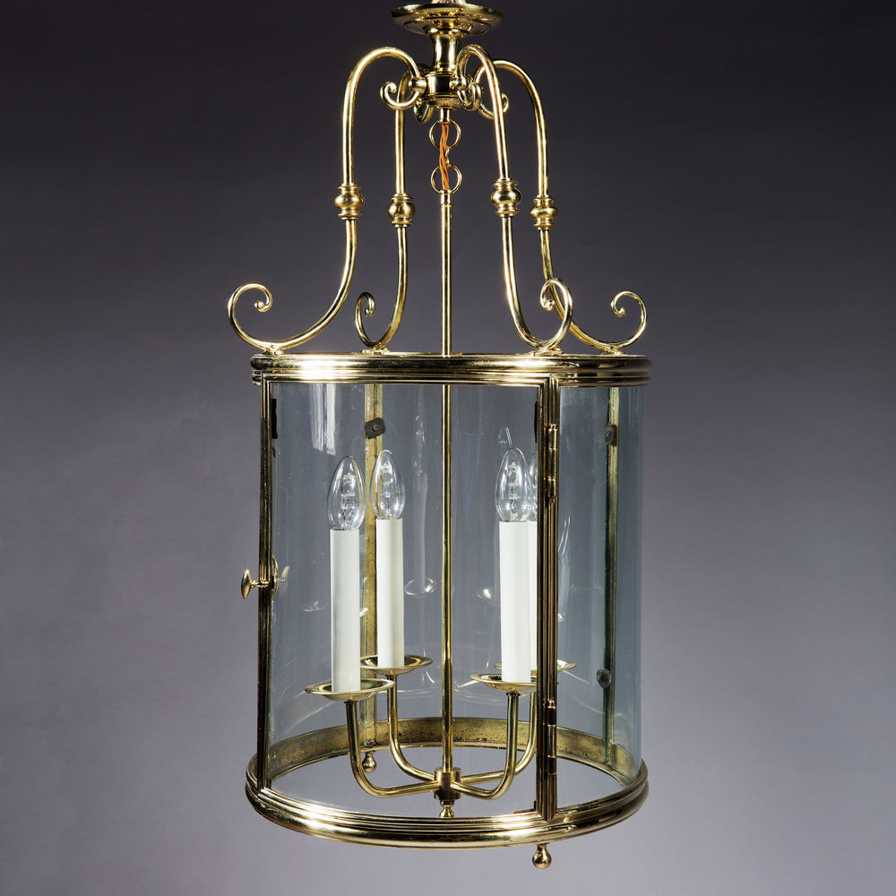 Large-scale French circular brass lantern with glass panels and candle-style lights by Collection TH10