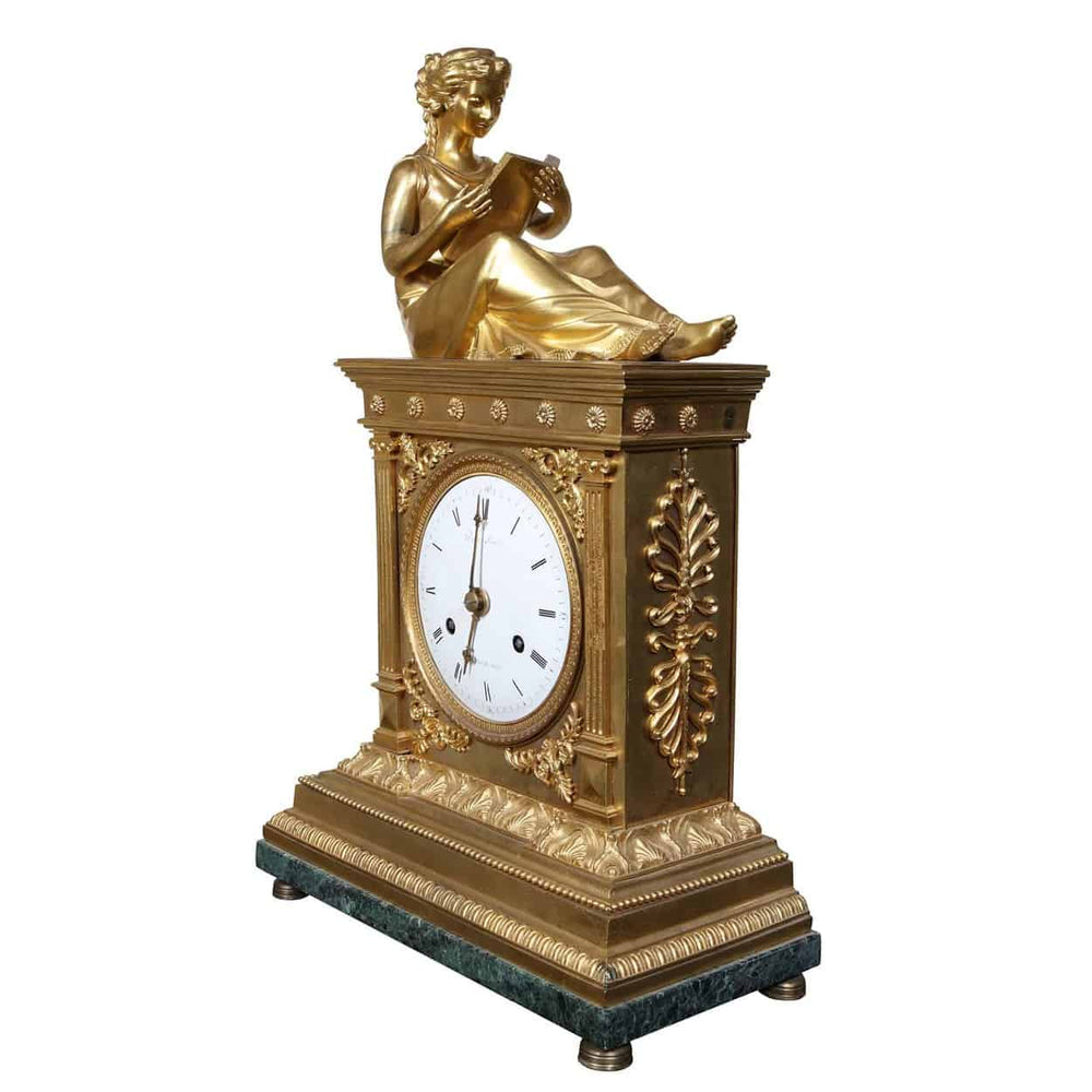 Early 19th-century French gilt mantle clock by Dautel with reading figure on Verde Antico marble base sold by Nwtiques