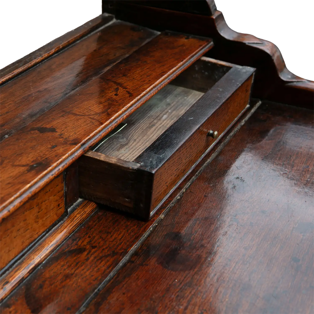 Close-up of open drawer on 18th Century oak Welsh dresser showcasing rich patina and fine craftsmanship Collection CK20