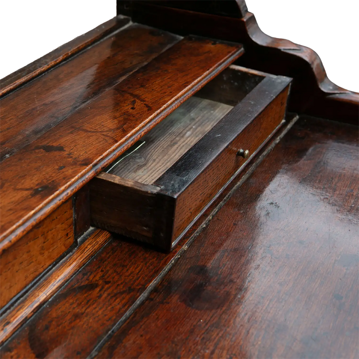 Close-up of open drawer on 18th Century oak Welsh dresser showcasing rich patina and fine craftsmanship Collection CK20