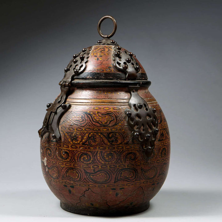 Rajasthani Wooden Jar and Cover with lacquer work, hinged lid, bronze mounts, circa 1880, 40cm tall, 28cm diameter.