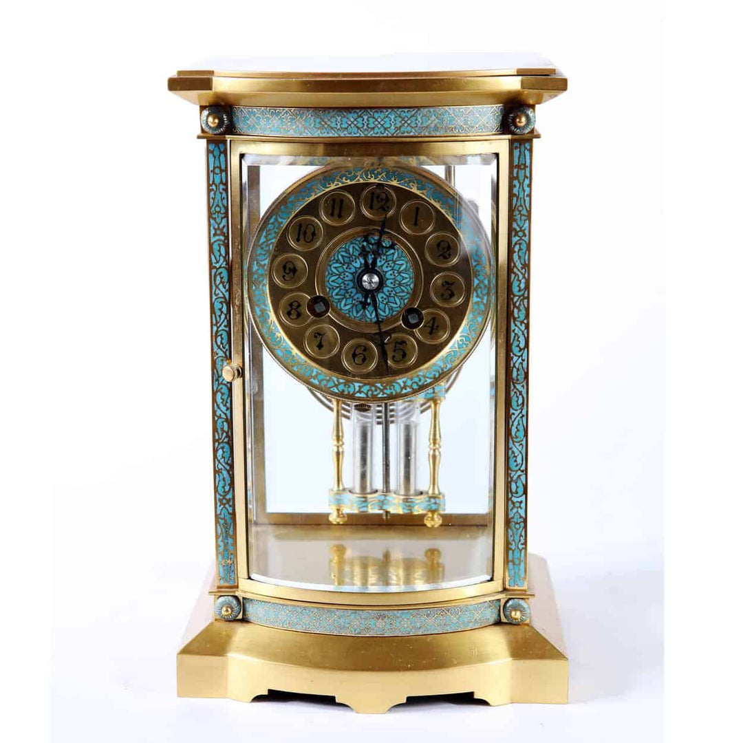 Champleve French carriage clock with blue enamel and mercury pendulum sold by Nwtiques