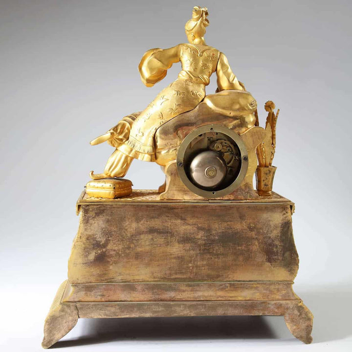 19th-century gilt bronze Ottoman mantle clock with seated lady, detailed ornamentation by Nwtiques