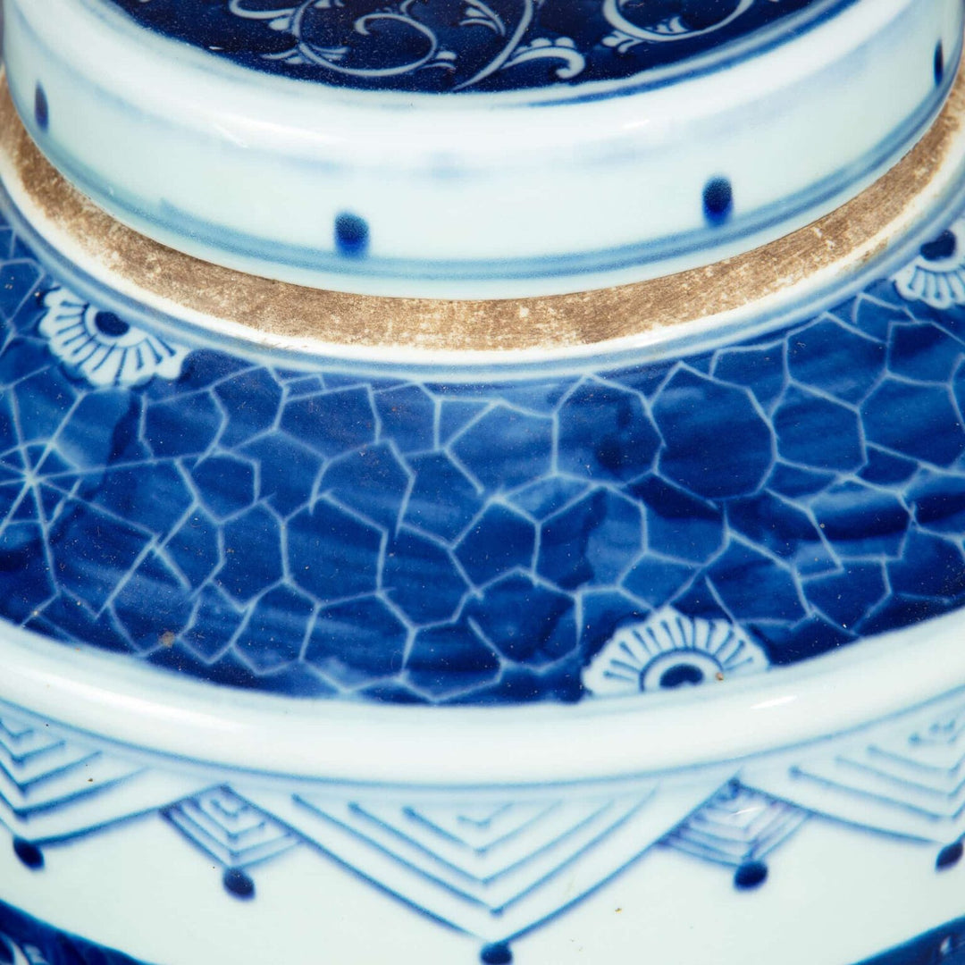 Pair of Chinese Blue and White Porcelain Ginger Jars as Lamps featuring intricate blue floral and geometric patterns.