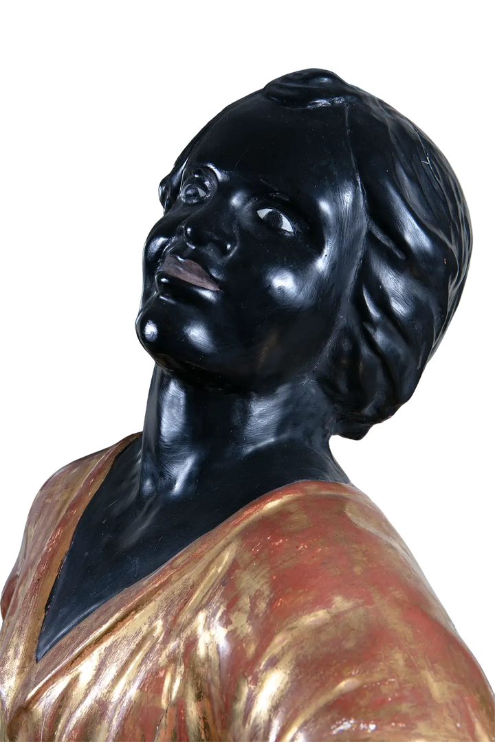 19th century Italian Blackamoor figure in gilt cloths by Nwtiques with polished ebonised finish
