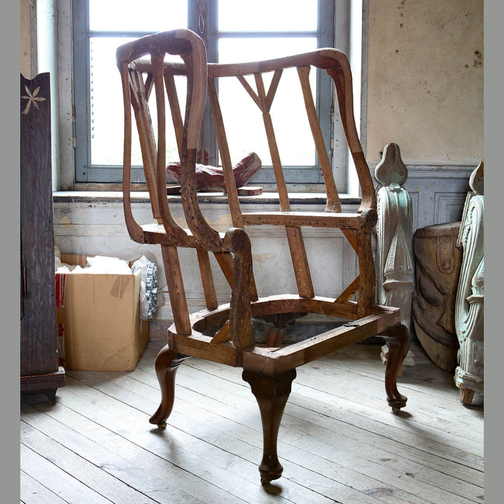 Early Georgian Wing Chair Frame by Collection EE30 showcasing elegant timber craftsmanship circa 1720 in period setting