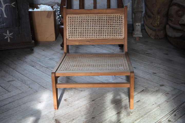 Mid-century modern Kangaroo Chandigarh Chair by Collection EE40 with teak frame and cane seat in vintage condition