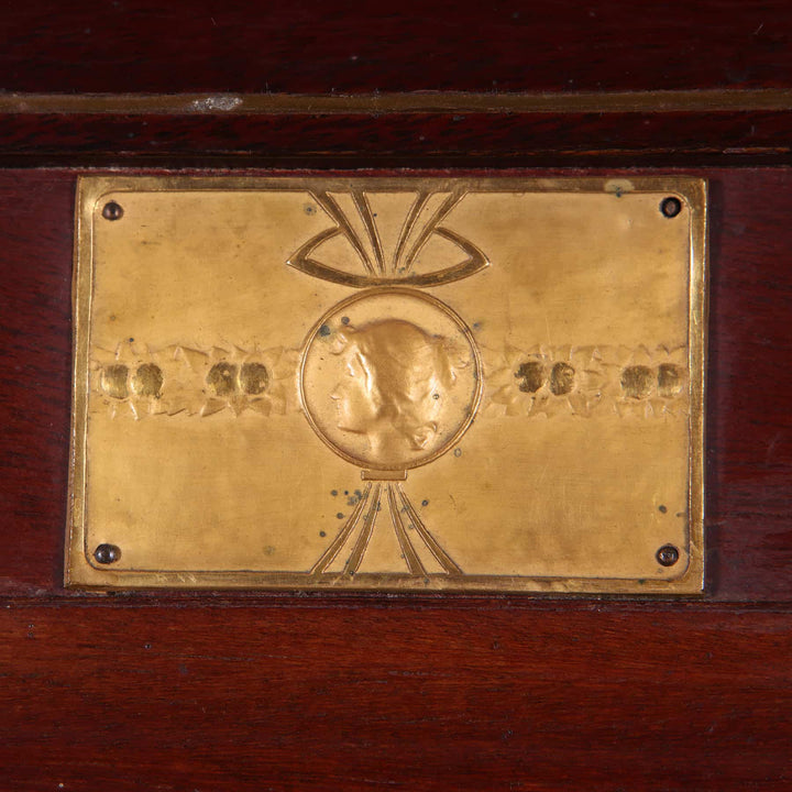 Brass plaque with embossed classical profile detail on German Secessionist Cabinet by Collection EE40.