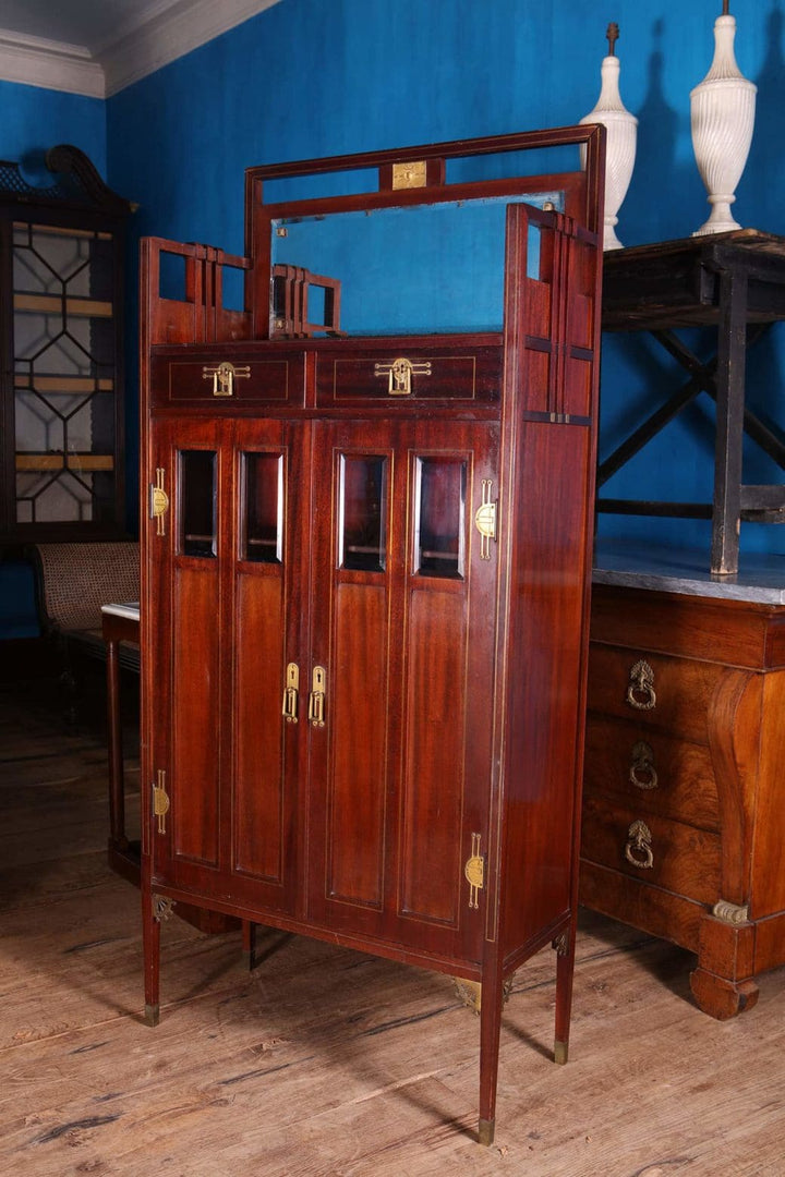 Tall German Secessionist cabinet by G. Ritter Dresden around 1900 in Collection EE40 with wood finish and brass accents