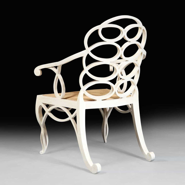 Elegant matt white Loop Chair with hoop back design by Collection EE30, featuring exceptional construction and oversized frame