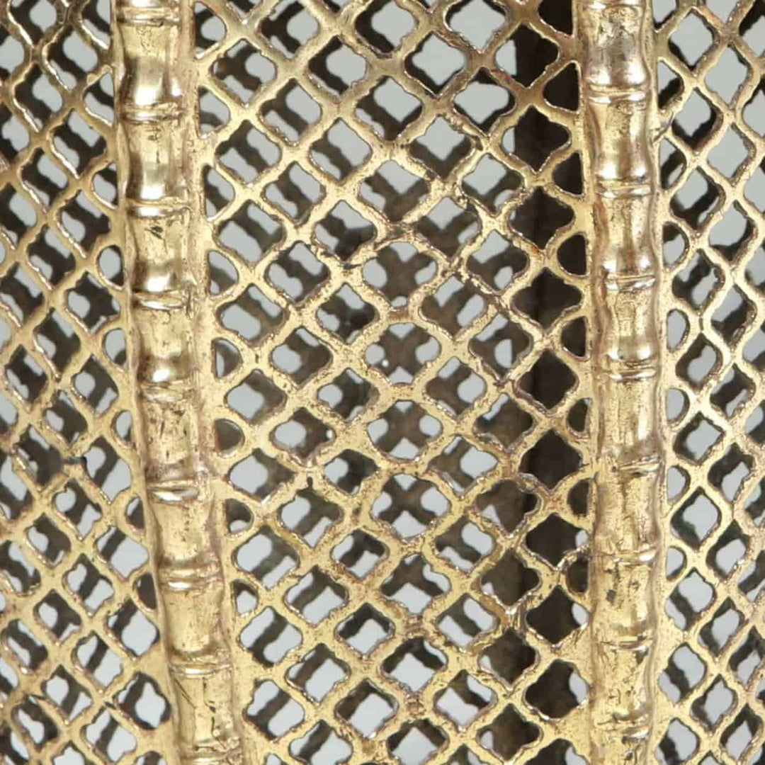 Close-up of pierced faux bamboo brass detailing on stools from Collection EE30 vintage India circa 1970