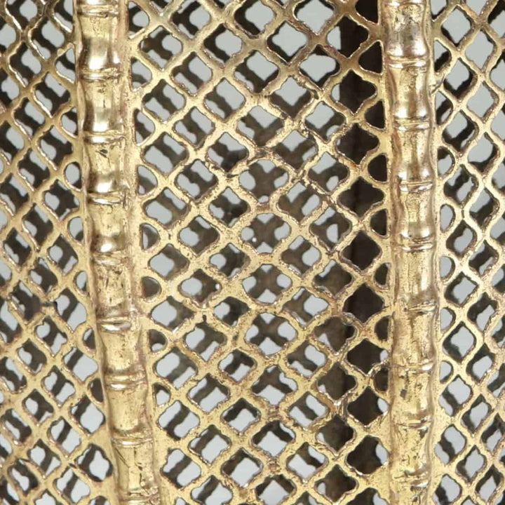 Close-up of pierced faux bamboo brass detailing on stools from Collection EE30 vintage India circa 1970