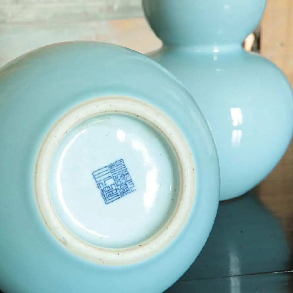 Pair of Celadon Blue Double Gourd Vase Table Lamps in pale blue monochrome with Chinese seal mark on base.