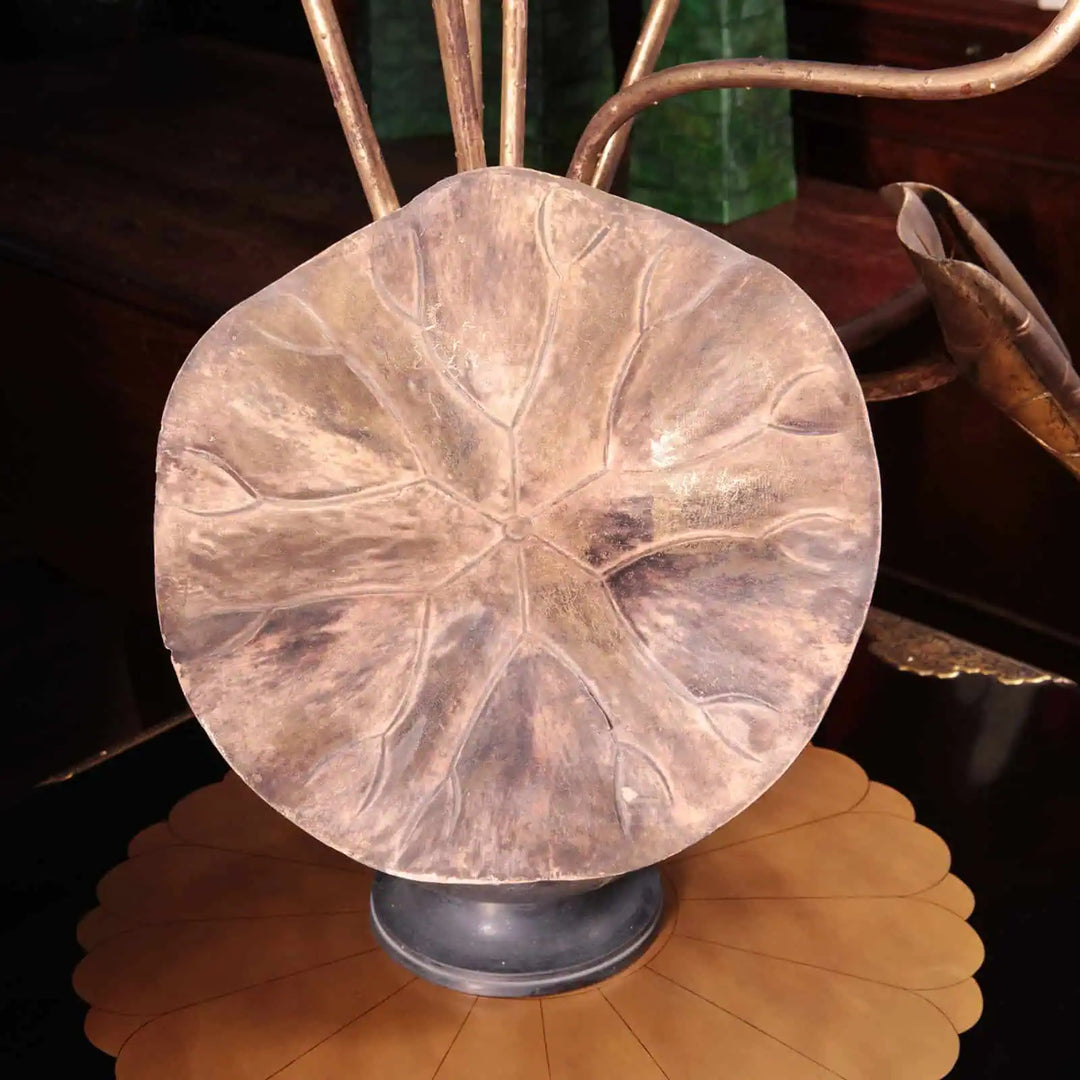 Close-up of a giltwood lotus flower with bronze vase base from the Collection EE20 Japanese Jyôka set