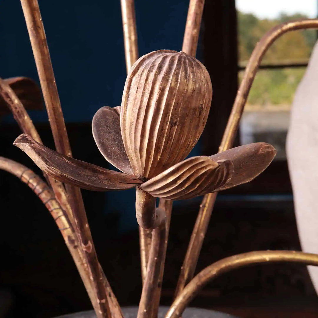 Close-up of a gold lacquered Jyôka lotus flower sculpture by Collection EE20 with detailed carved petals and stem.