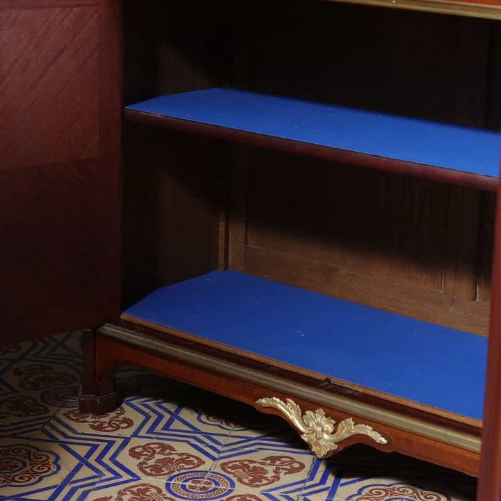 Interior view of late 19th century Napoleon III French vitrine cabinet with blue shelves by Nwtiques