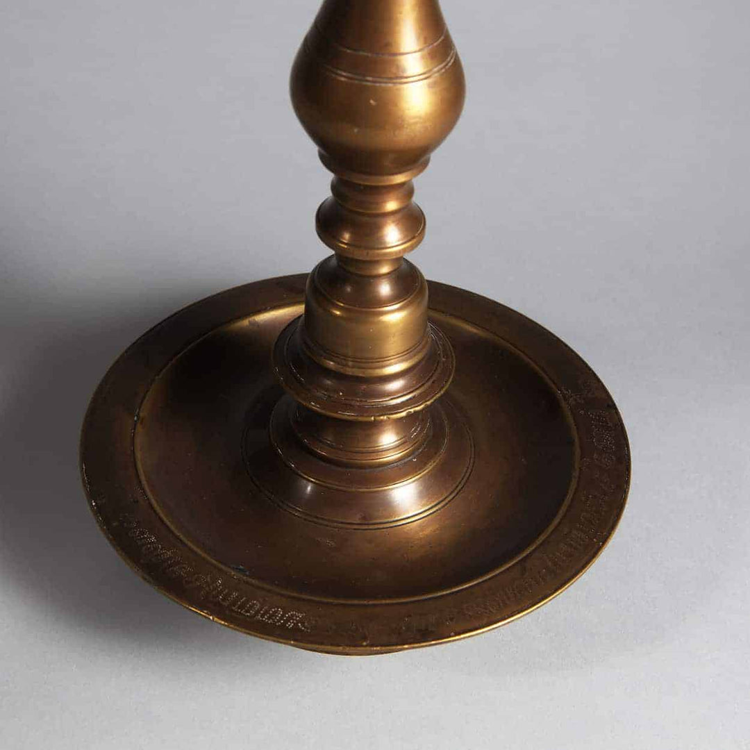 Close-up of brass base detail for Matched Pair of Turned Brass Indian Table Lamps from 19th century India.
