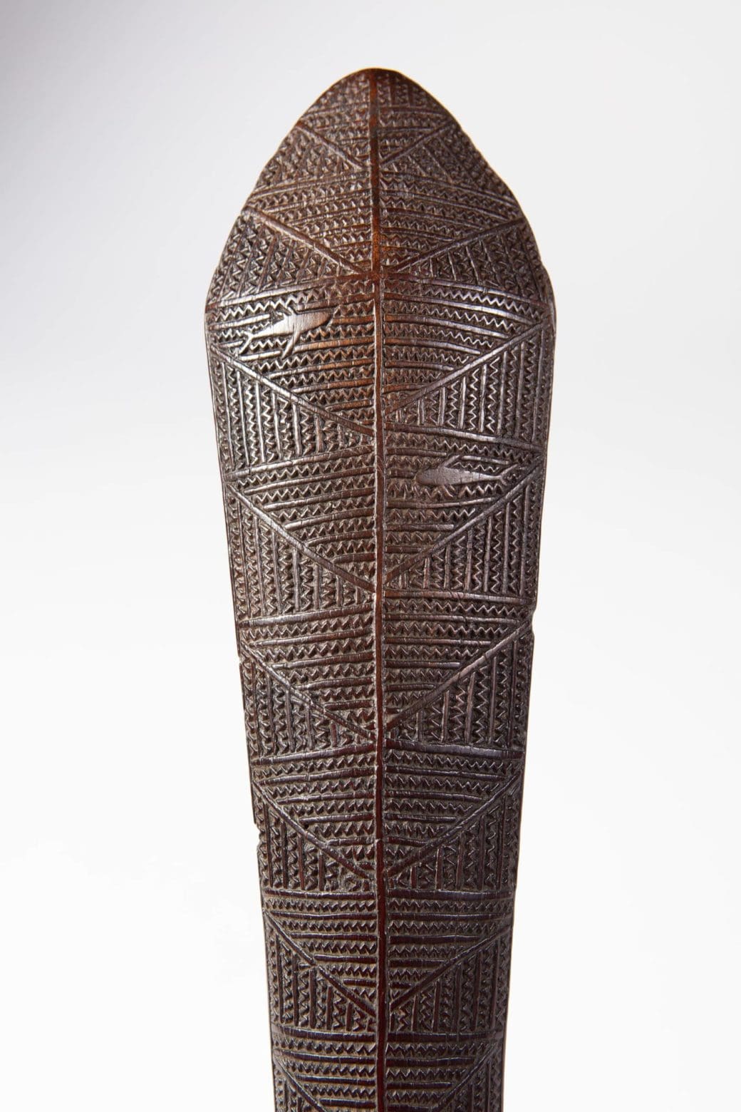 Detailed close-up of an early 19th century Native Tongan ironwood war club by Collection ON10