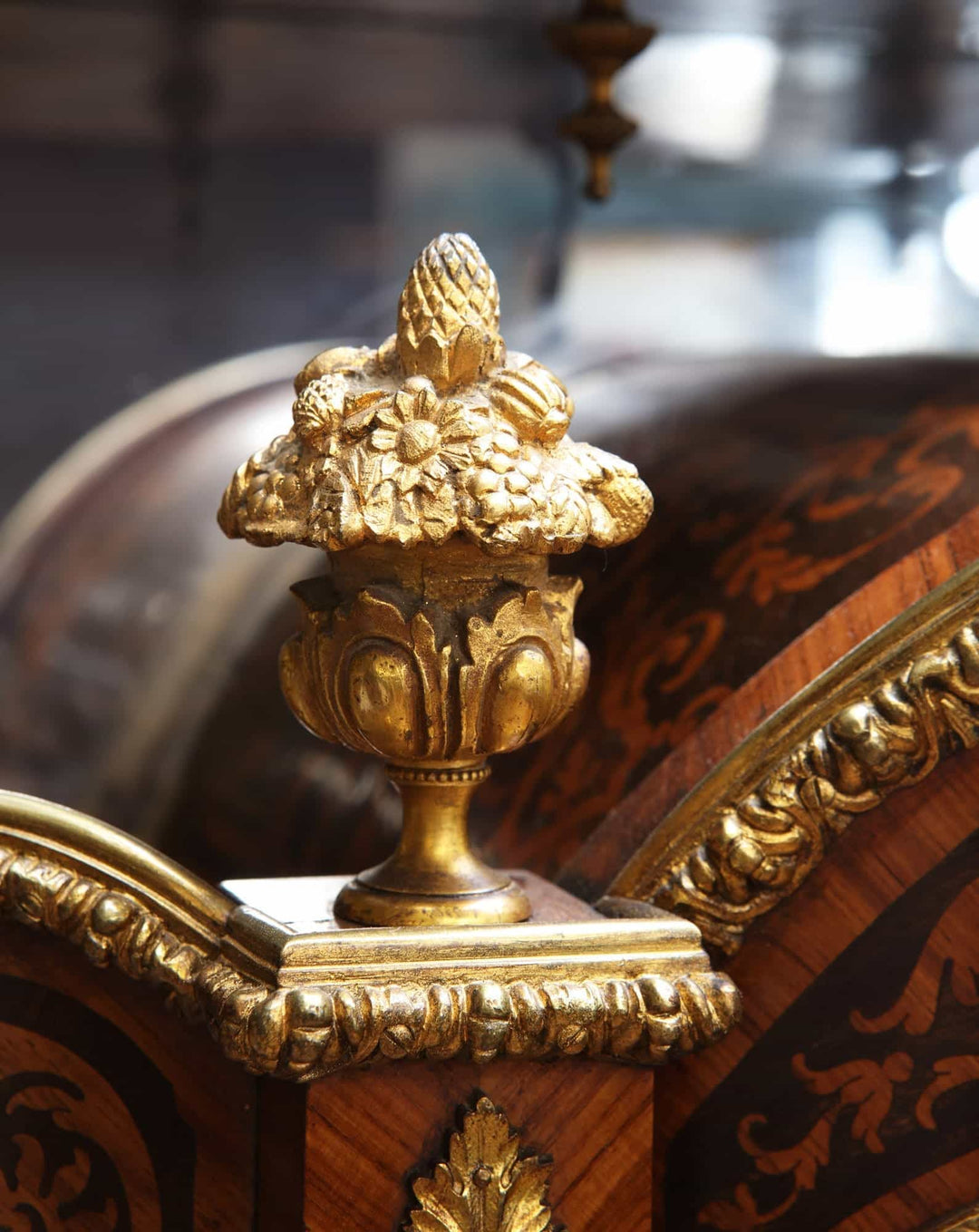 Close-up of gilt bronze floral finial on Napoleon III marquetry secretaire by Nwtiques