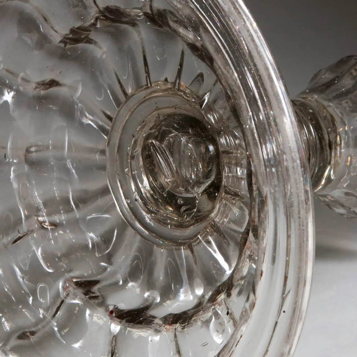 Close-up of 18th century Venetian grey glass candlestick with stepped base by Collection EE10
