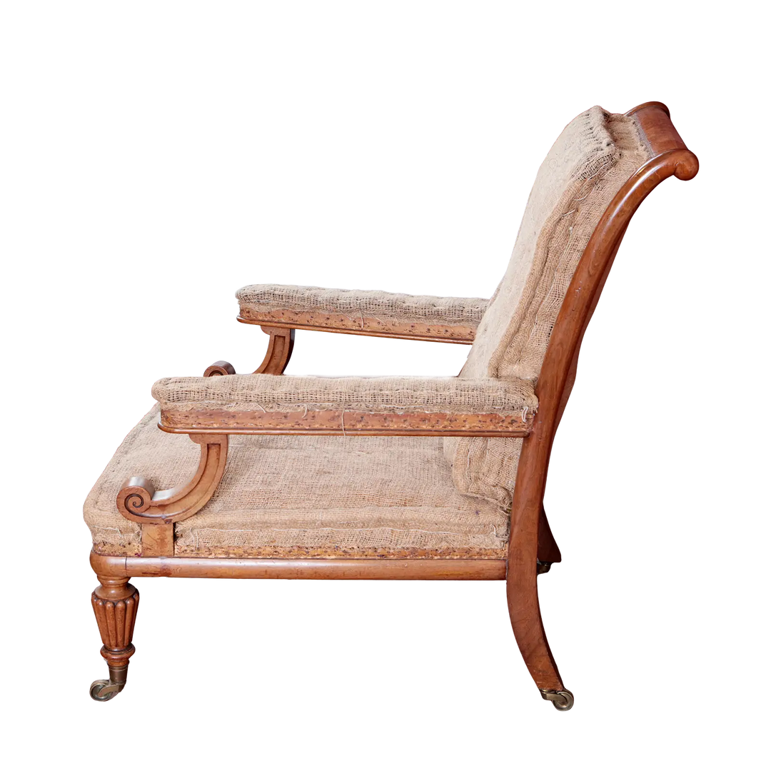 William IV walnut library chair with original upholstery and brass castors from Collection EE30, circa 1830s England.