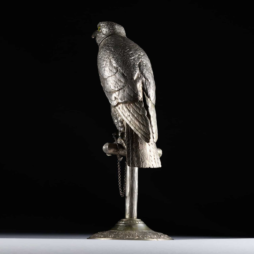 German early 20th century solid silver perched hawk sculpture with glass eyes on wooden perch by Collection CK20
