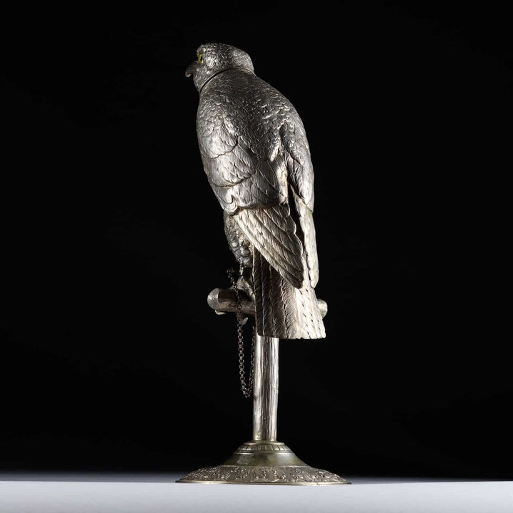 German early 20th century solid silver perched hawk sculpture with glass eyes on wooden perch by Collection CK20