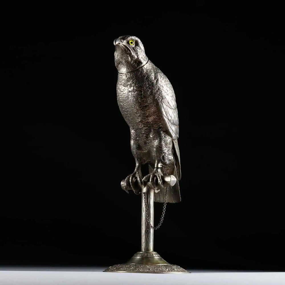 German early 20th century solid silver perched hawk sculpture by Collection CK20 with glass eyes on wooden post