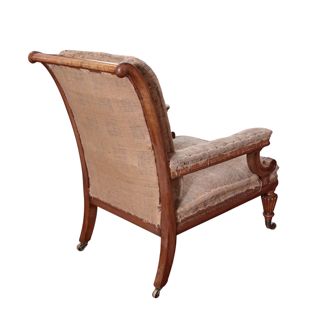 William IV walnut library chair with brass castors, elegant curves, and original upholstery by Collection EE30