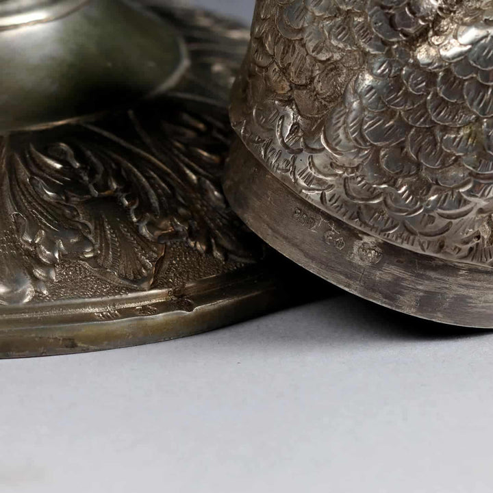 Close-up of early 20th century German solid silver hawk sculpture featuring intricate feather detail by Collection CK20