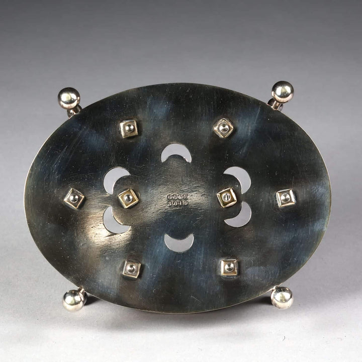 Underside of Hukin & Heath silver plated 6 egg cruet with hallmark and ball feet from Nwtiques